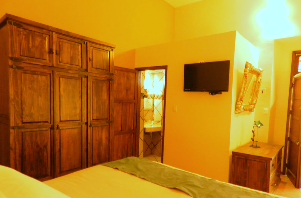 Collection O Al Otro Lado Del Rio, Puebla Hotel Luaran gambar A room at the hotel