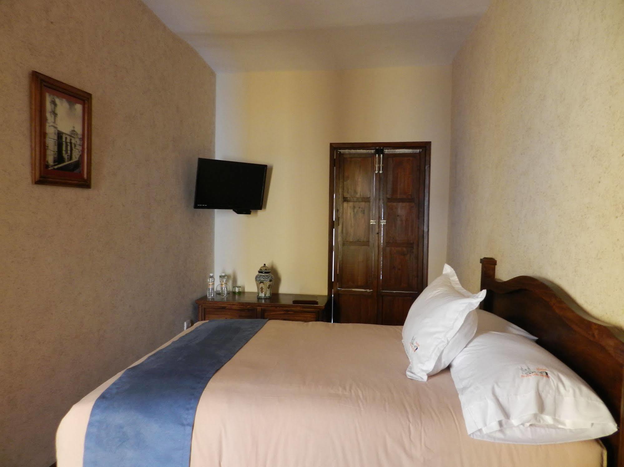 Collection O Al Otro Lado Del Rio, Puebla Hotel Luaran gambar A room at the hotel