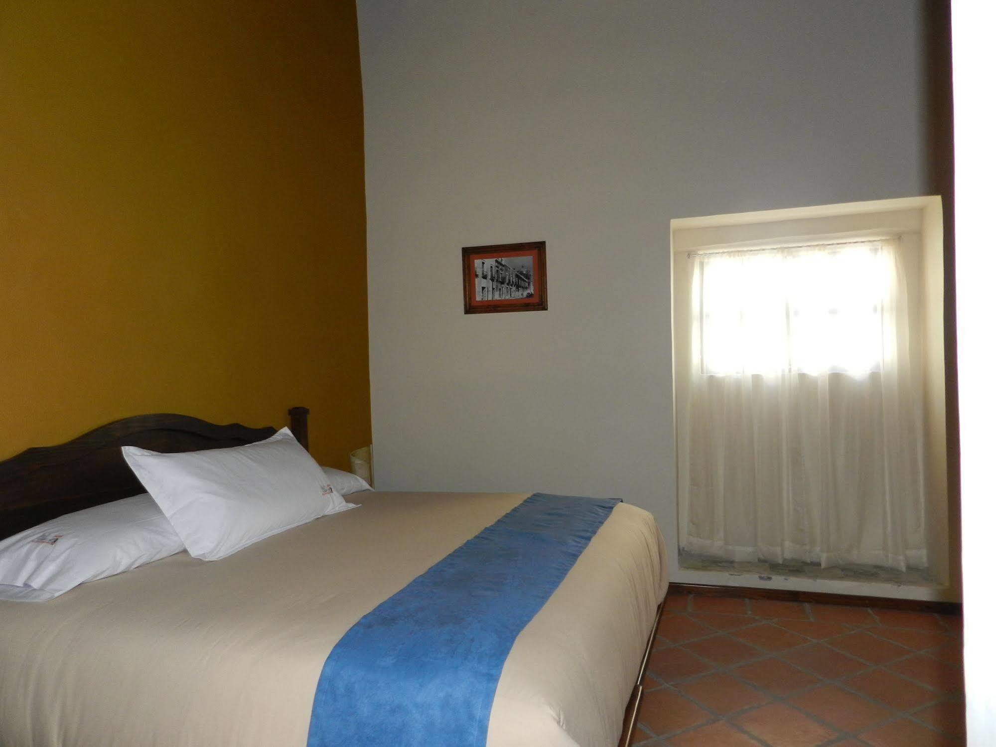 Collection O Al Otro Lado Del Rio, Puebla Hotel Luaran gambar A room at the hotel