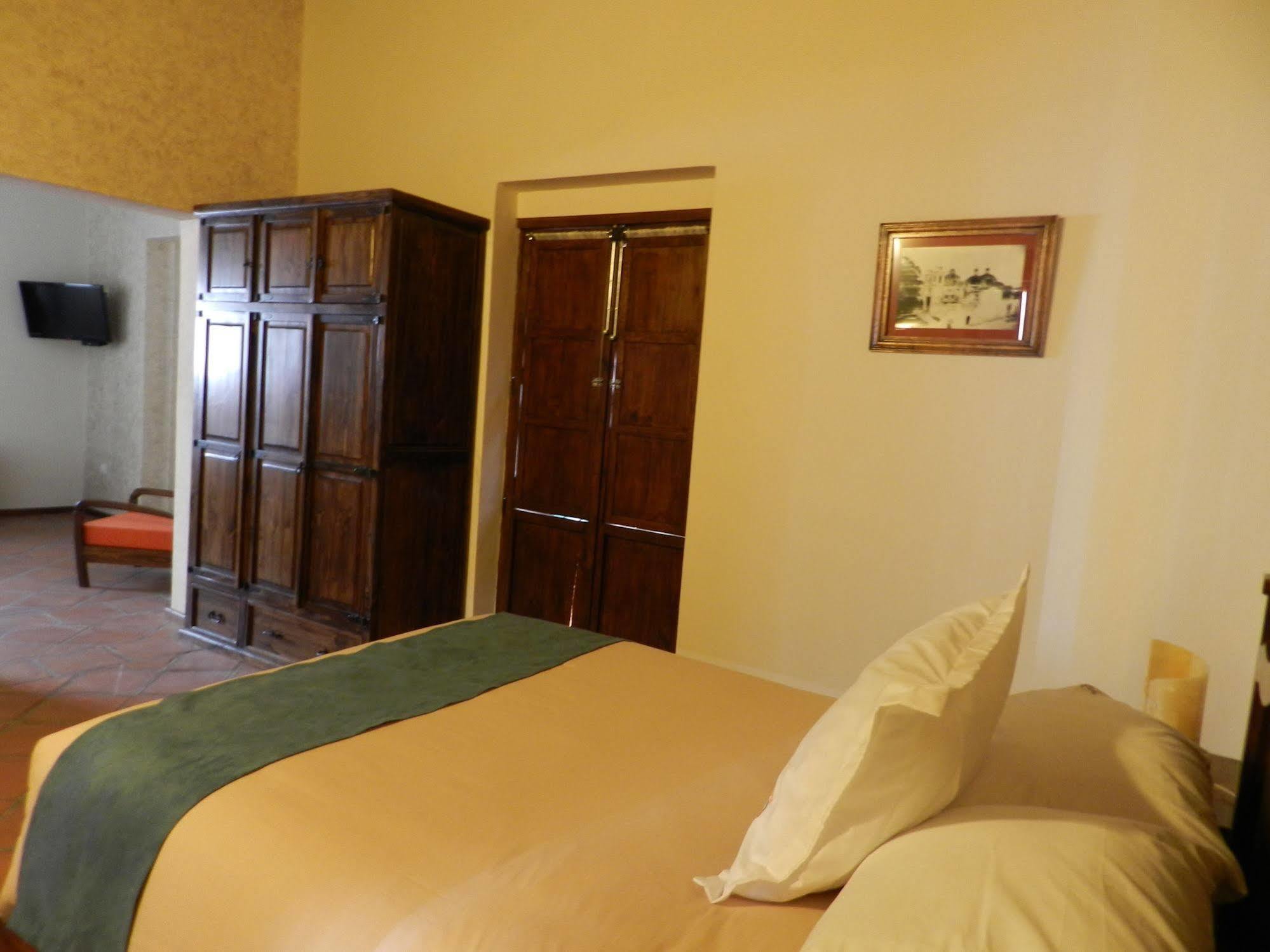 Collection O Al Otro Lado Del Rio, Puebla Hotel Luaran gambar A room at the hotel